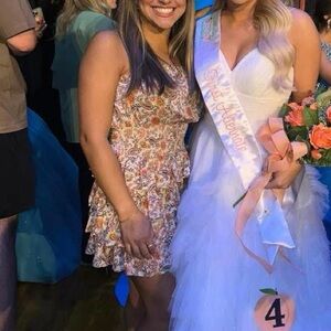 Elegant White Gown with Floral Accents